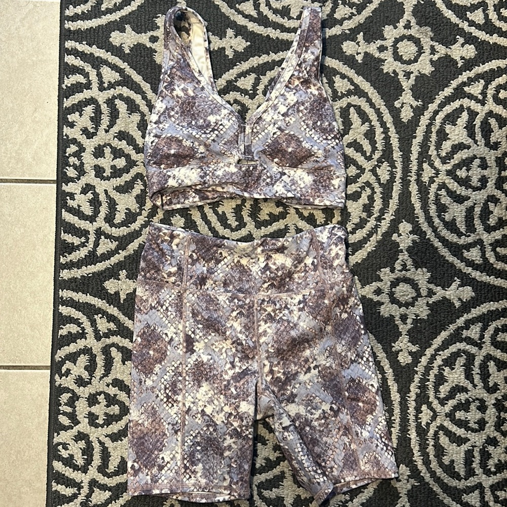 Jessica Simpson purple snakeskin workout set